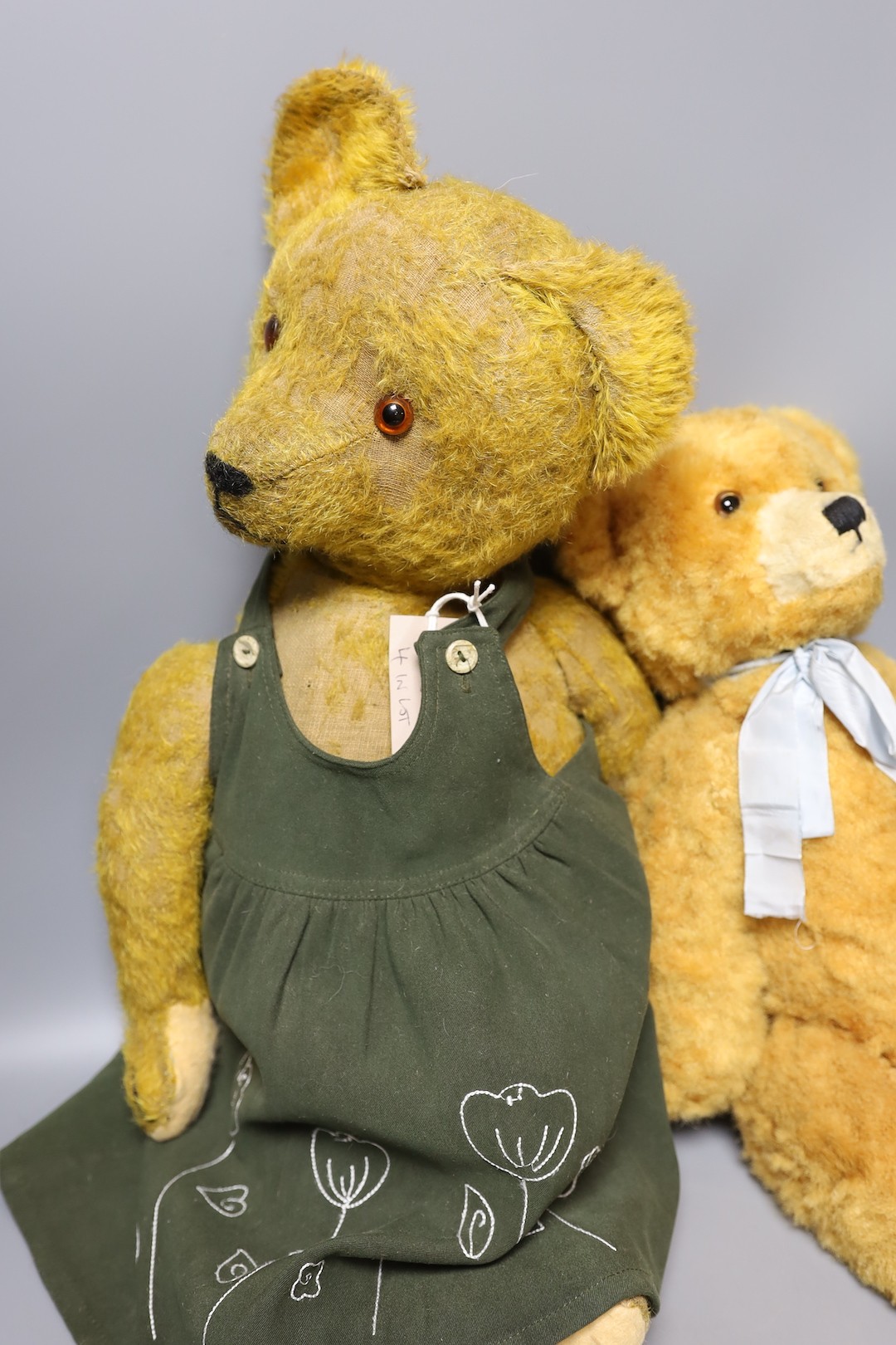 A 1930's bear in green dress, 58cm, with a synthetic European Bear, 40cm, and a synthetic european bear, 47cm, also a invicta beard, 40cm